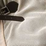 Tan horse mesh sheet with custom trim and piping