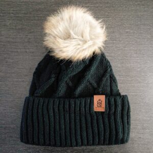 Equestrian pom pom hat with option to customize with your horse logo, cable knit horse pom pom hat, equestrian team gear with custom logo, cable knit pom pom hat, sp rhodes pom pom hat, equestrian team gifts, best horse show awards