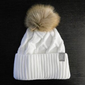 equestrian pom pom hat made of high-quality cable knit material with horse logo